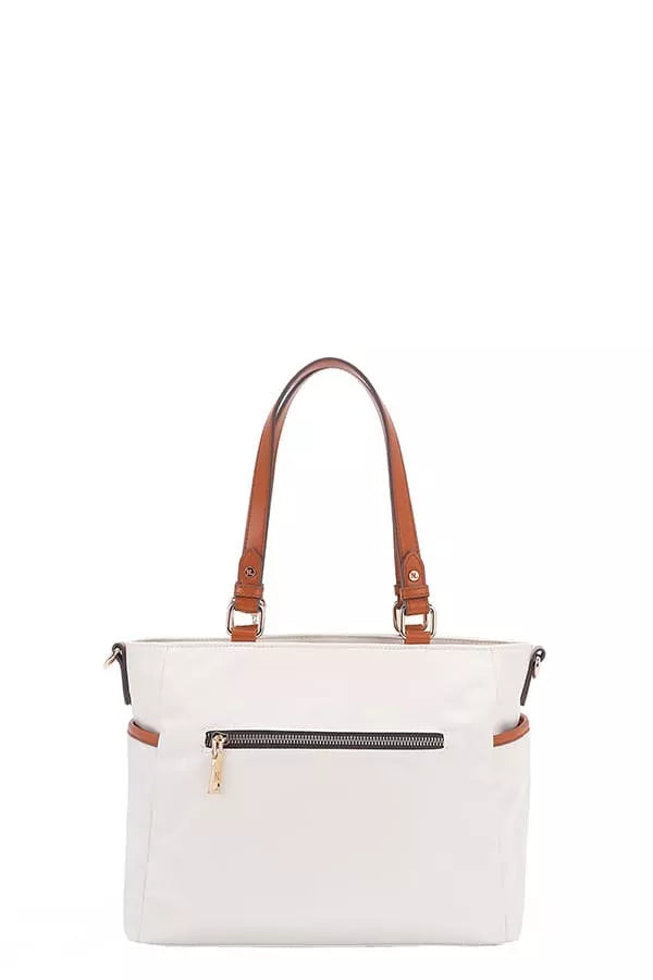 White handbag with brown handles and trim on a white background