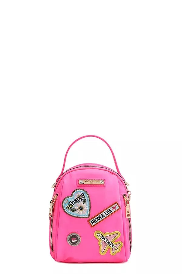 Pink backpack with colorful patches on a white background