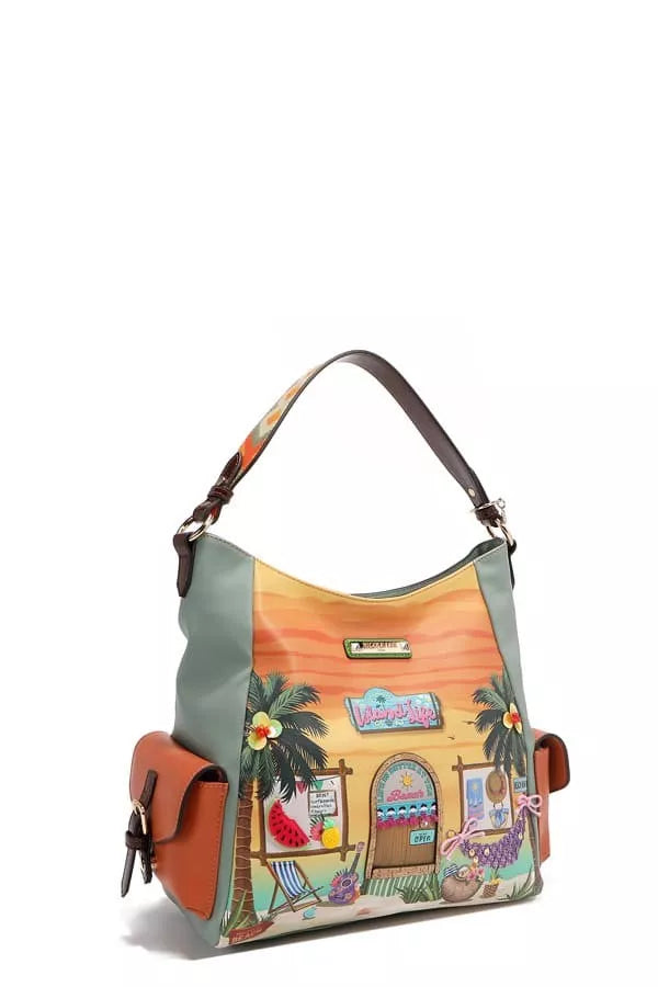 Handbag with a colorful design of a beach scene on a white background