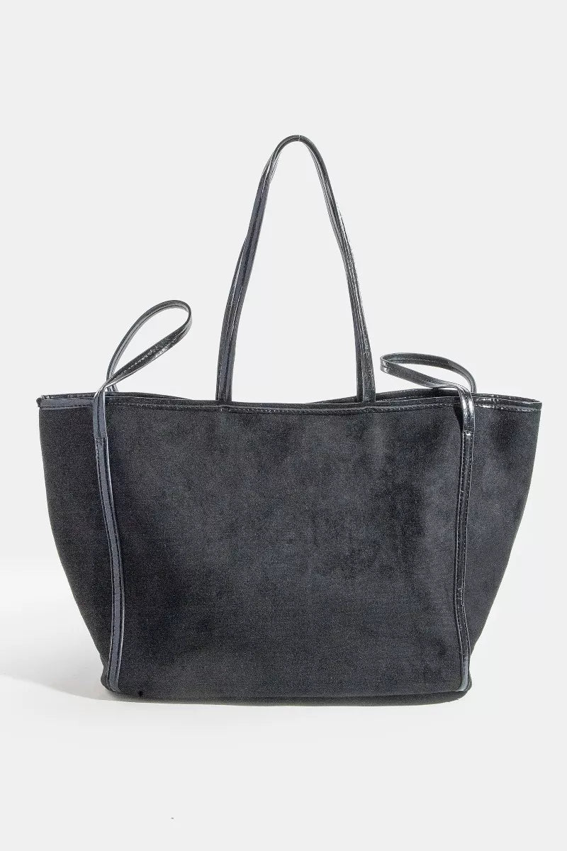 Black suede tote bag on a white background