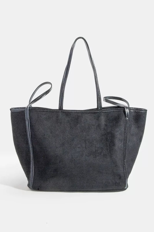 Black suede tote bag on a white background