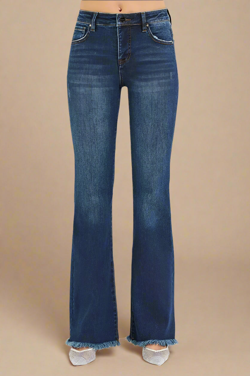 Blue jeans on a beige background