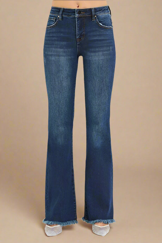 Blue jeans on a beige background