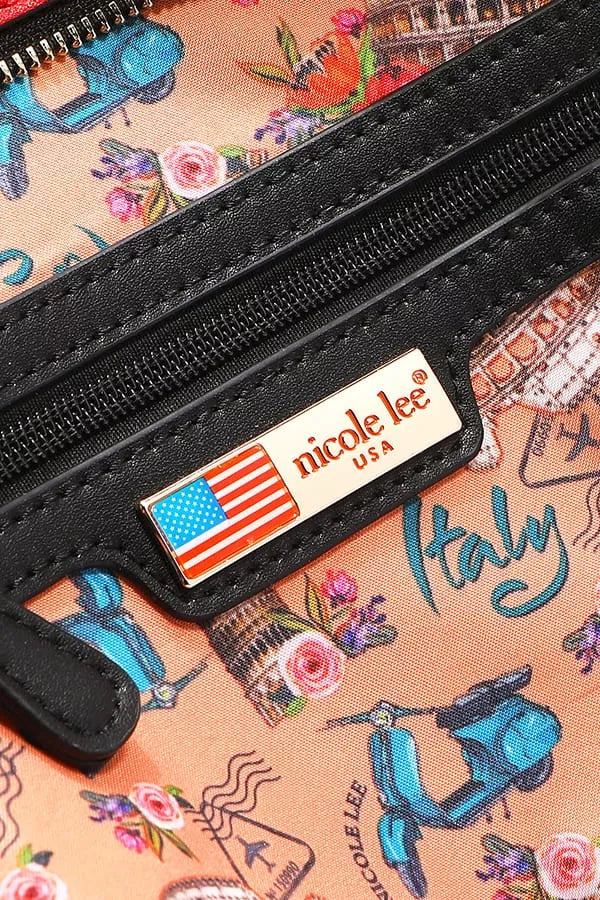 Close-up of a black zipper with a 'nicole lee' label on a floral and scooter-patterned background.