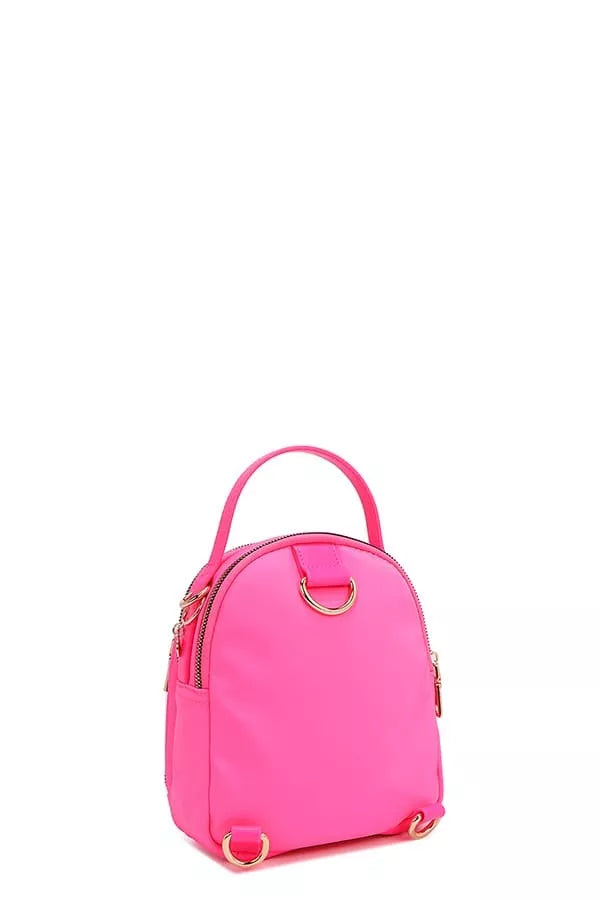 Pink backpack with gold accents on a white background