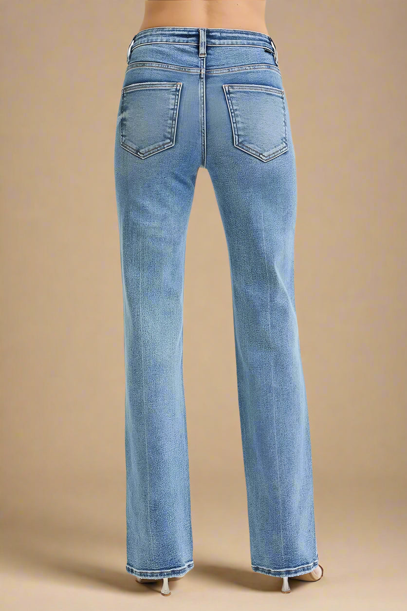 Blue jeans on a beige background