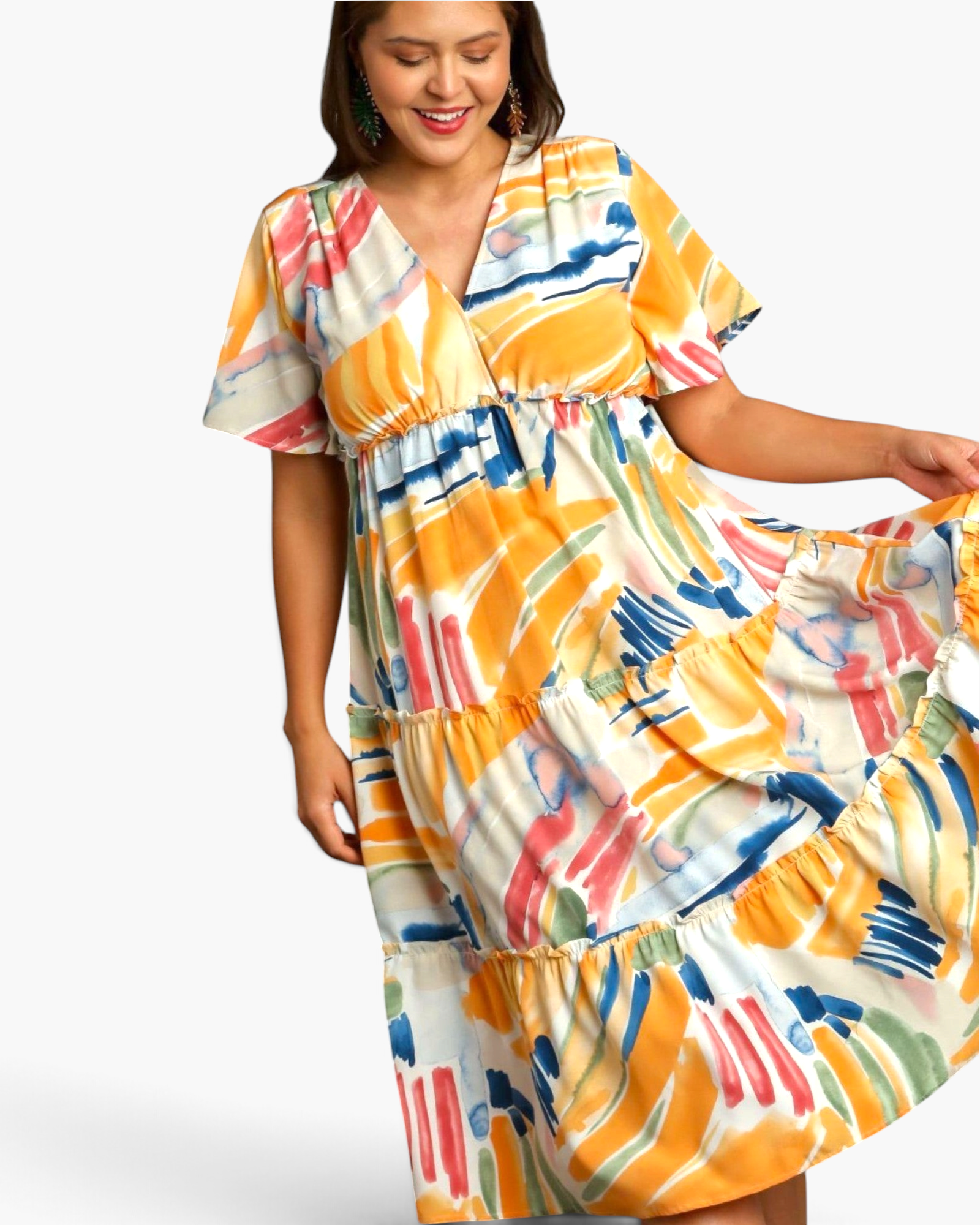 Beach Rose Co. yellow multicolor abstract print midi dress with flutter sleeves and a tiered ruffled skirt on a model