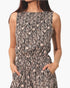 Beach Rose Co. sleeveless bubble jumpsuit in a black and beige abstract print with a relaxed, flowy silhouette.