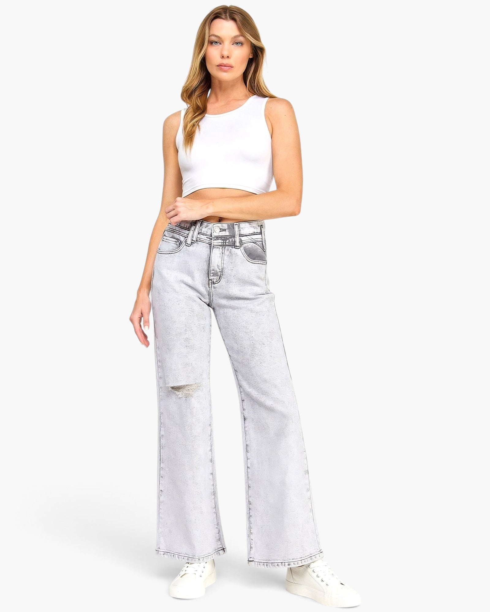 Beach Rose Co. high-rise wide-leg jeans in acid grey wash with subtle distressing, worn by a model with a white top.