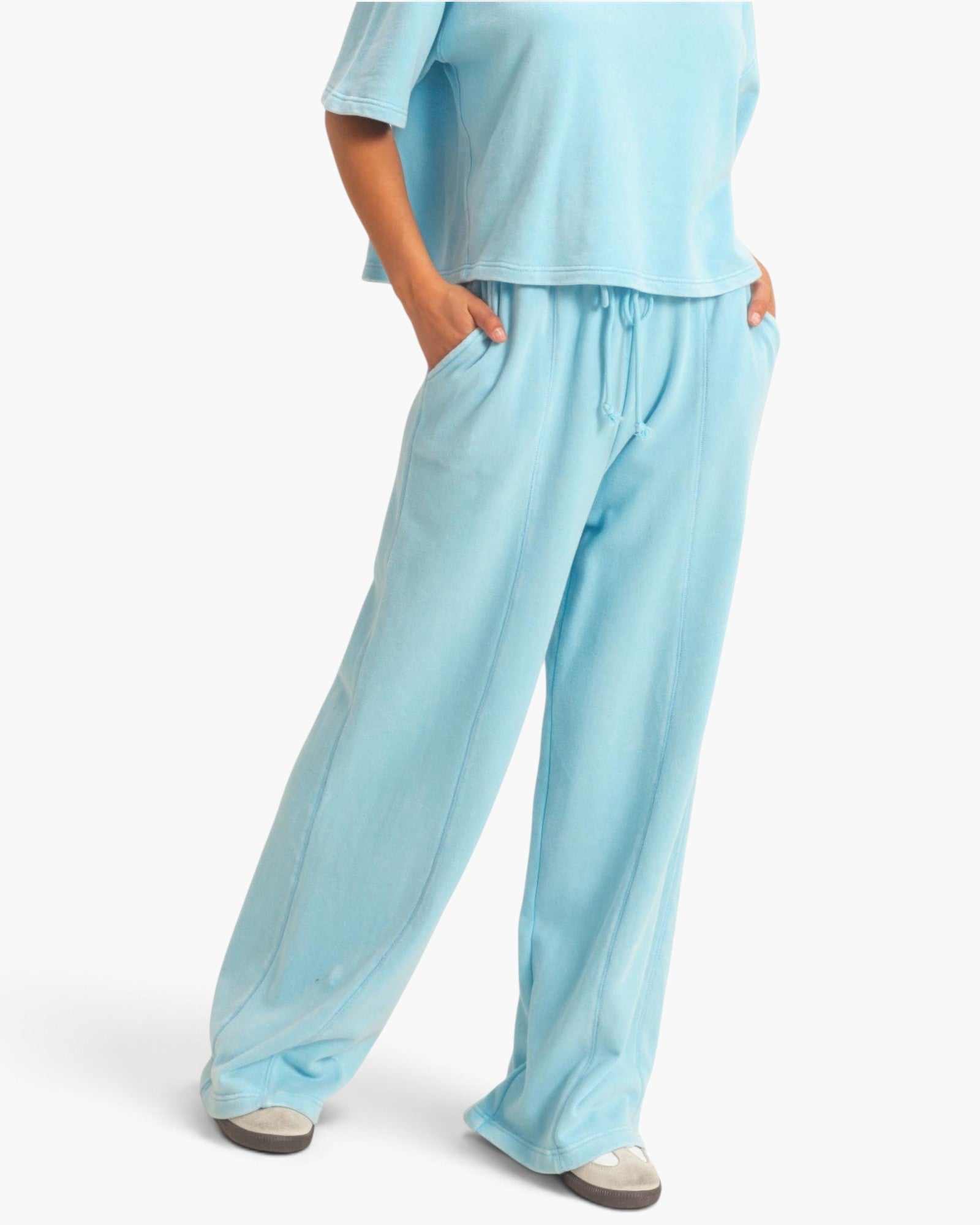 Beach Rose Co. light blue acid wash French terry wide-leg pants with a drawstring waist and front seam detail