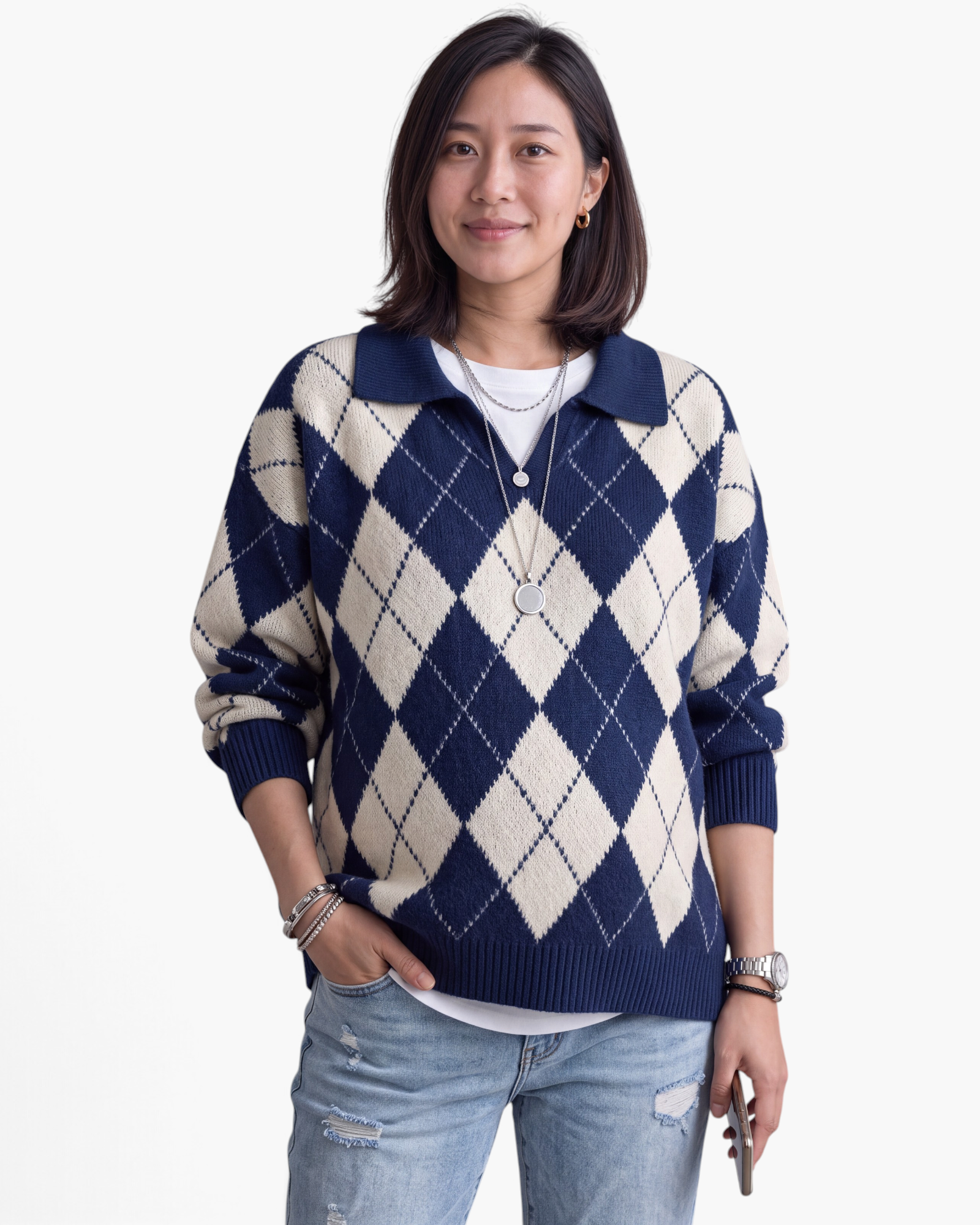 Beach Rose Co. relaxed V-neck sweater featuring a navy and cream argyle diamond pattern, fold-over collar, and ribbing.