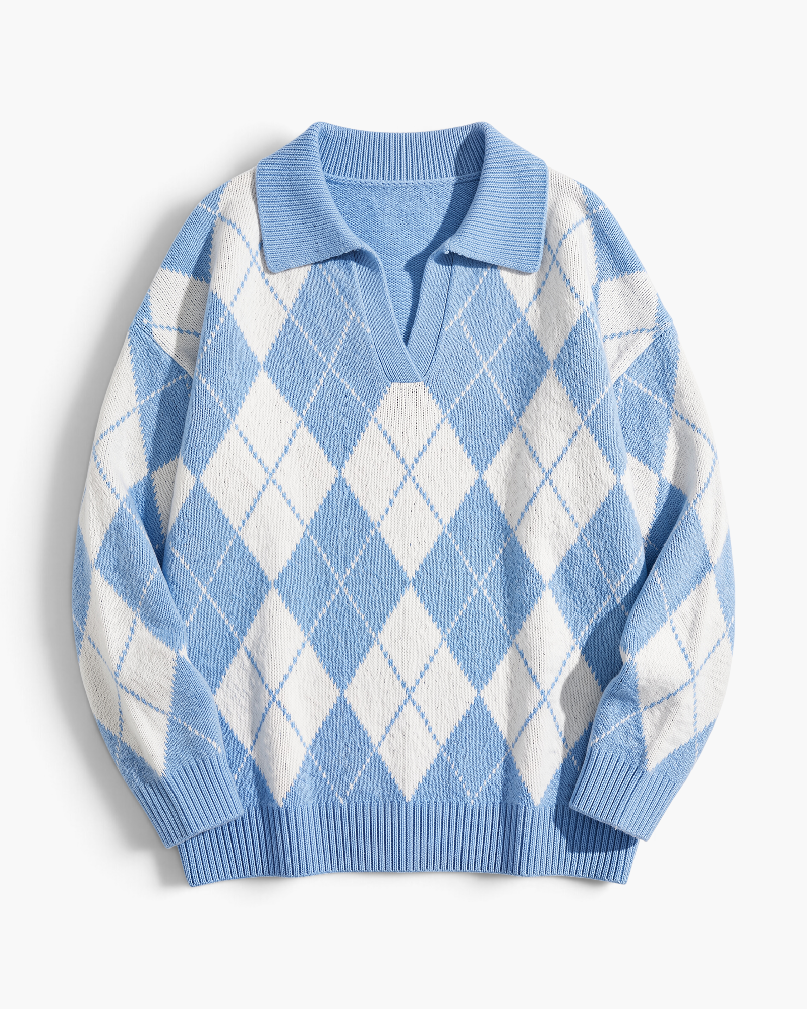 Beach Rose Co. blue and white argyle V-neck sweater with a fold-over collar and relaxed fit.