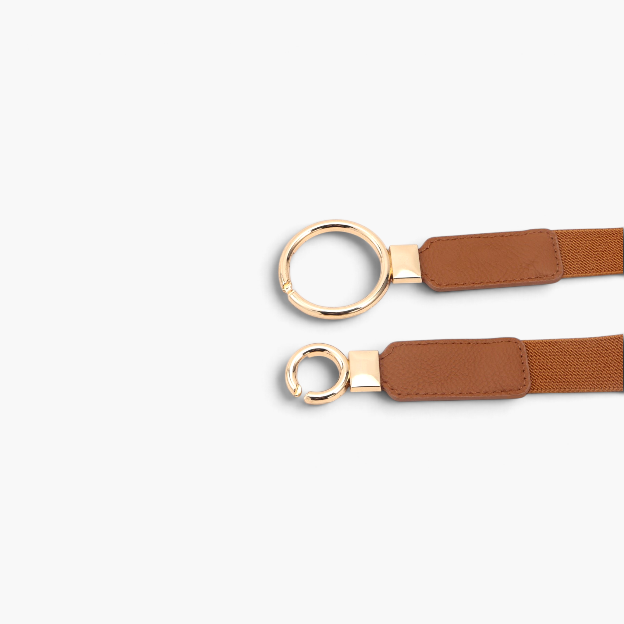 Beach Rose Co. slim elastic waist belt with brown PU tabs and an asymmetric gold-tone interlocking double-ring buckle.