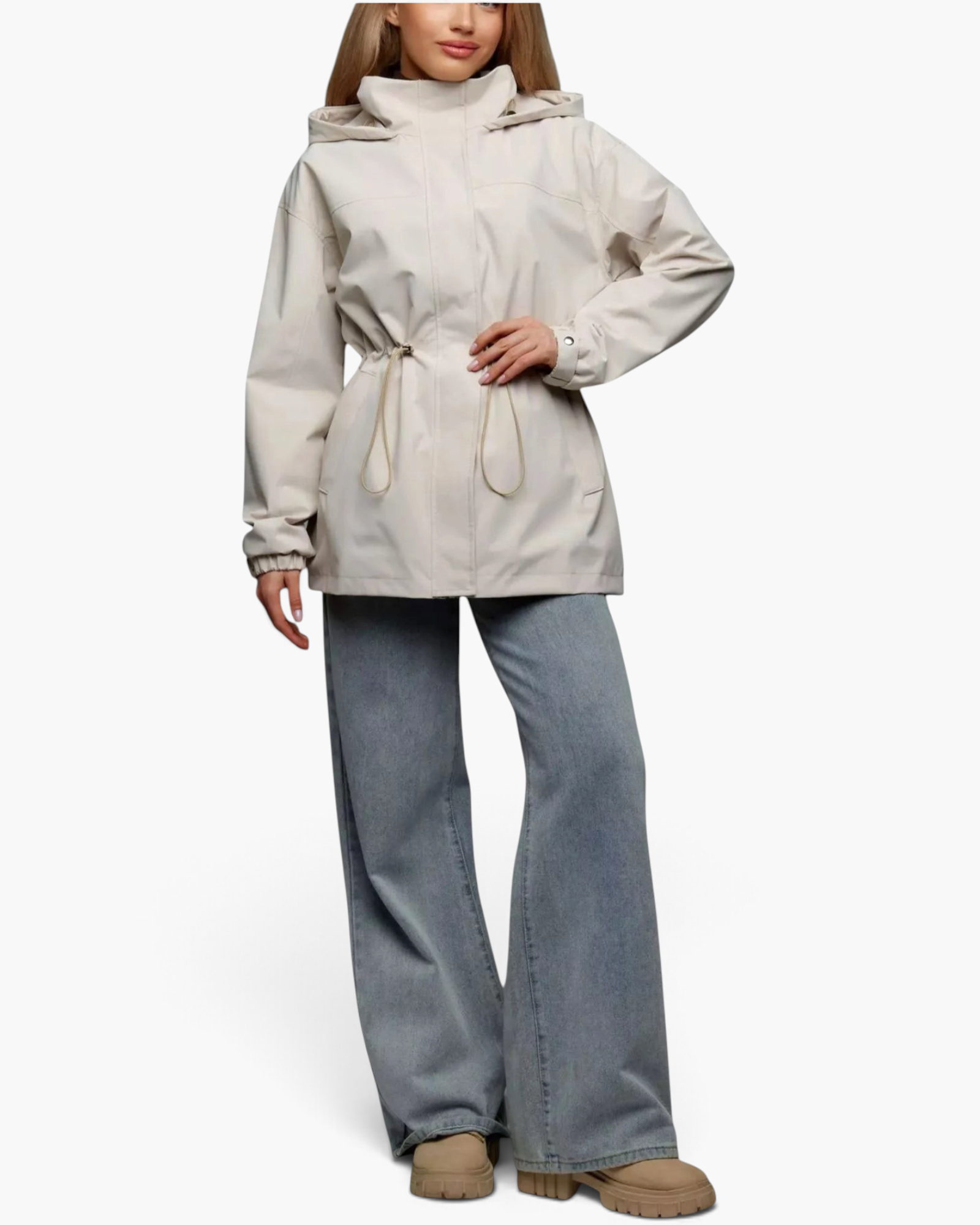 Beach Rose Co. beige hooded jacket with drawstring waist, zip front, and snap placket worn with wide-leg jeans