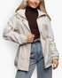 Beach Rose Co. beige hooded jacket with drawstring waist, zip front, and snap placket worn by a smiling blonde model.
