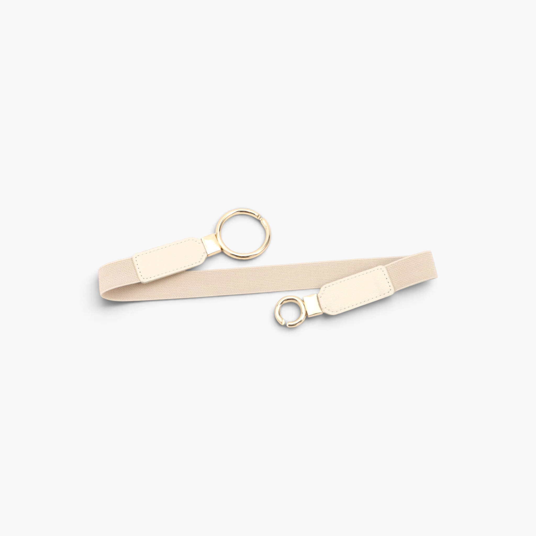 Beach Rose Co. slim beige elastic waist belt with an asymmetric gold double-ring buckle and stitched PU tabs.