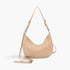 Beach Rose Co. beige faux leather shoulder bag with a unique strap design and mixed metal hardware details.
