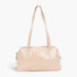 Beach Rose Co. beige faux leather sport bag with a secure zipper closure and long shoulder straps
