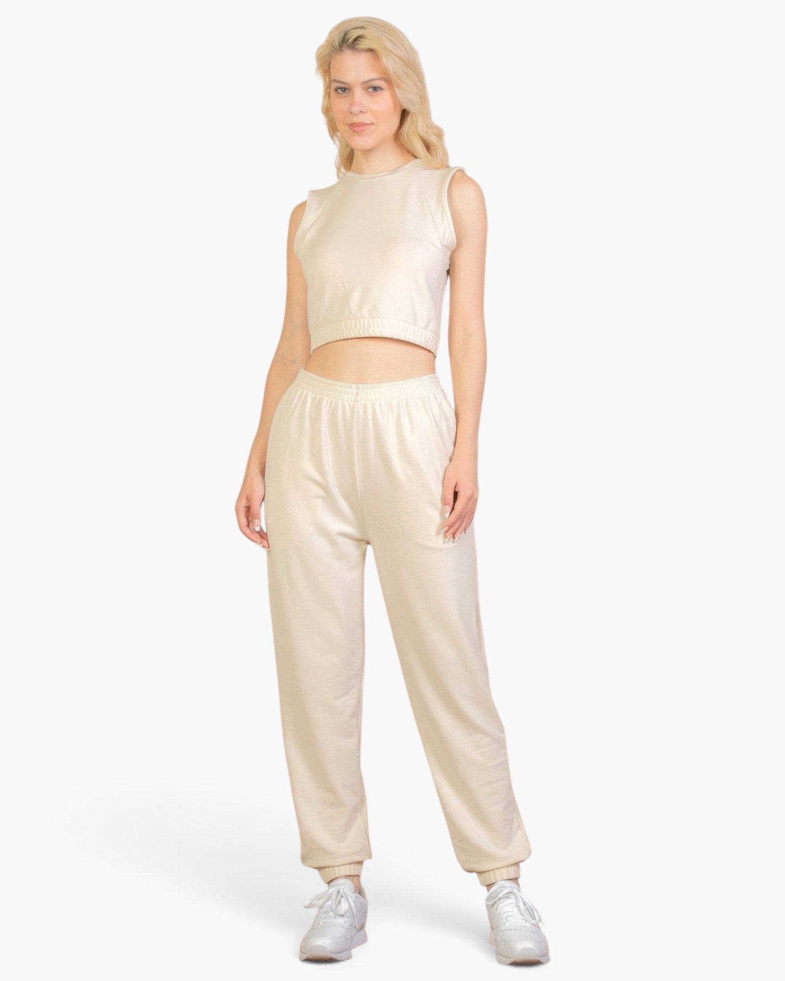 Beach Rose Co. beige French Terry tank top and joggers set worn by a blonde model with white sneakers