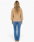 Beach Rose Co. Desiree long sleeve knit cardigan in beige with drop shoulders, viewed from the back on a model.