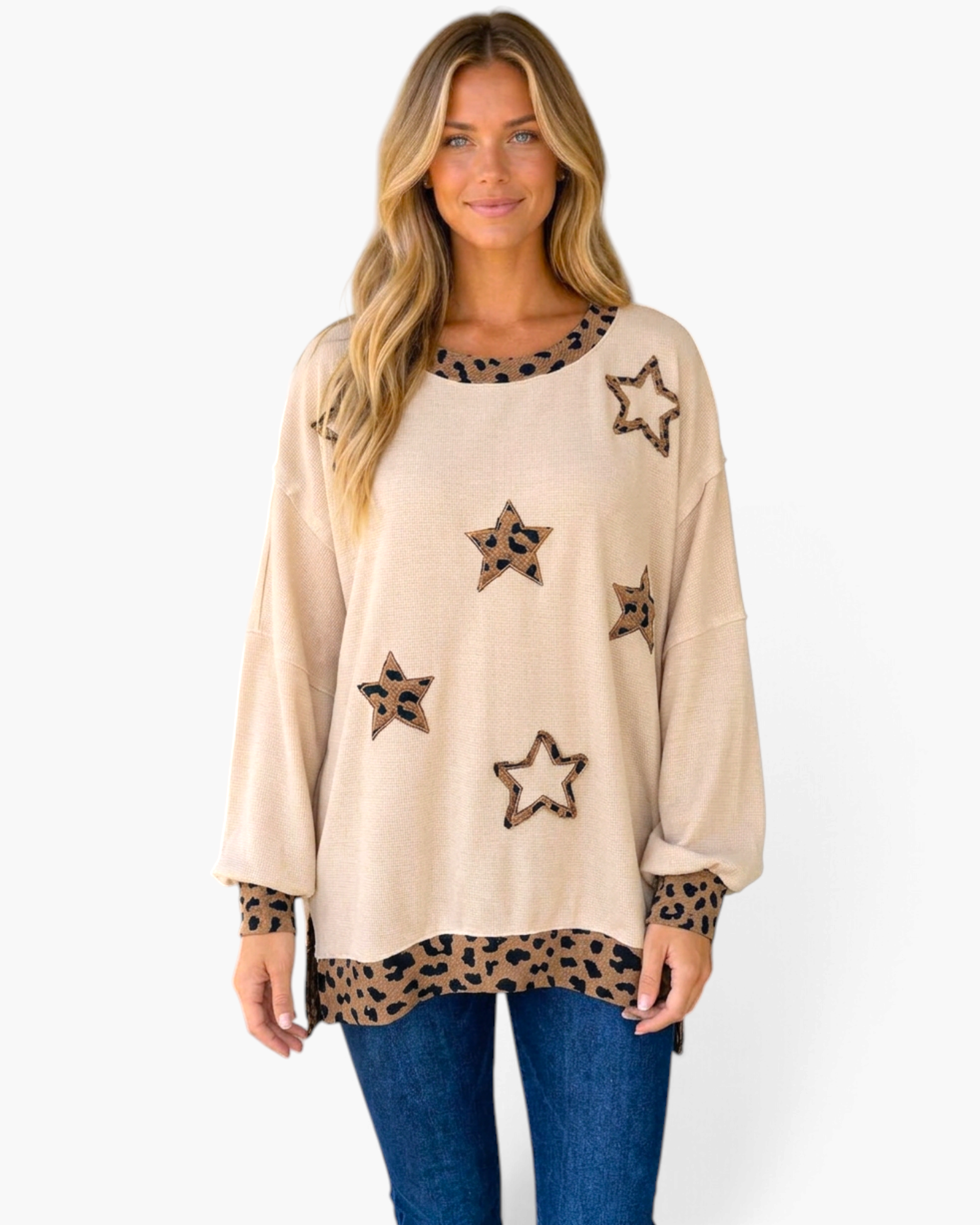 Beach Rose Co. beige relaxed top with leopard print star appliqués, balloon sleeves, and matching leopard trim.