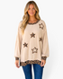 Beach Rose Co. beige relaxed top with leopard print star appliqués, balloon sleeves, and matching leopard trim.