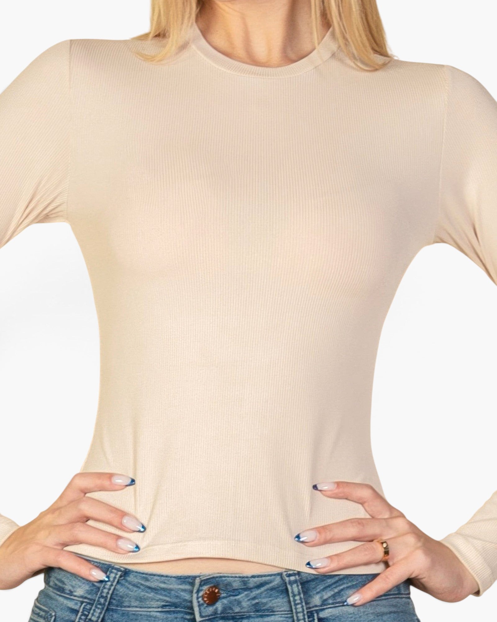 Beach Rose Co. beige ribbed long-sleeve crew-neck top with a fitted silhouette worn with blue denim jeans.