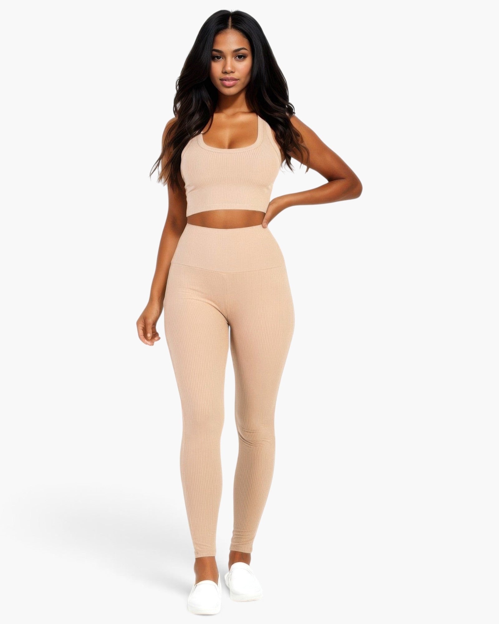Beach Rose Co. model wearing a beige ribbed crop top and high-waisted leggings set with a flattering fit.