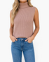 Beach Rose Co. beige sleeveless ribbed knit turtleneck sweater worn with blue denim jeans