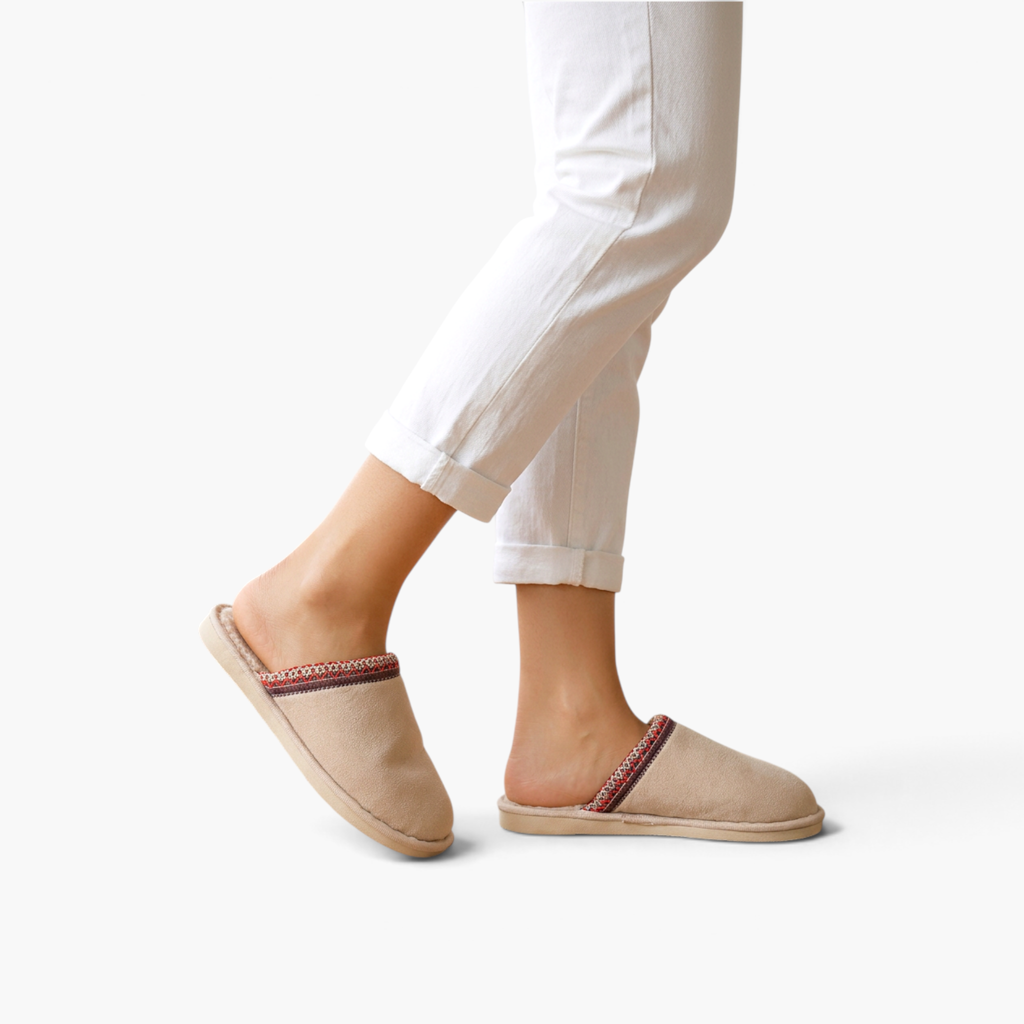 Beach Rose Co. Melanie Detail winter slippers in beige suede with patterned trim worn with white trousers