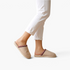 Beach Rose Co. Melanie Detail winter slippers in beige suede with patterned trim worn with white trousers
