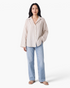 Beach Rose Co. beige and white striped button-up shirt with a relaxed fit, collared neckline, and wide long sleeves.