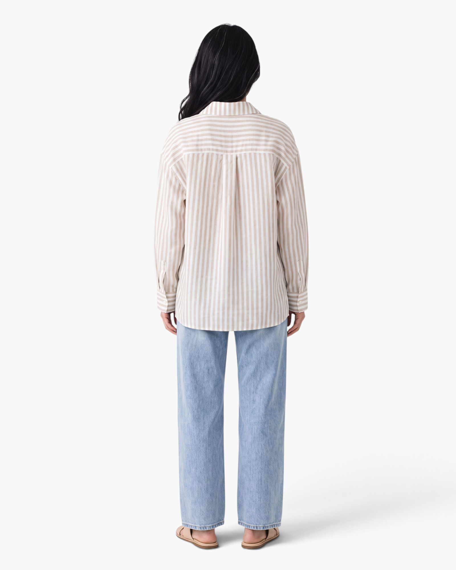 Back view of Beach Rose Co. beige and white striped polyester button-up shirt with a relaxed fit and back pleat.