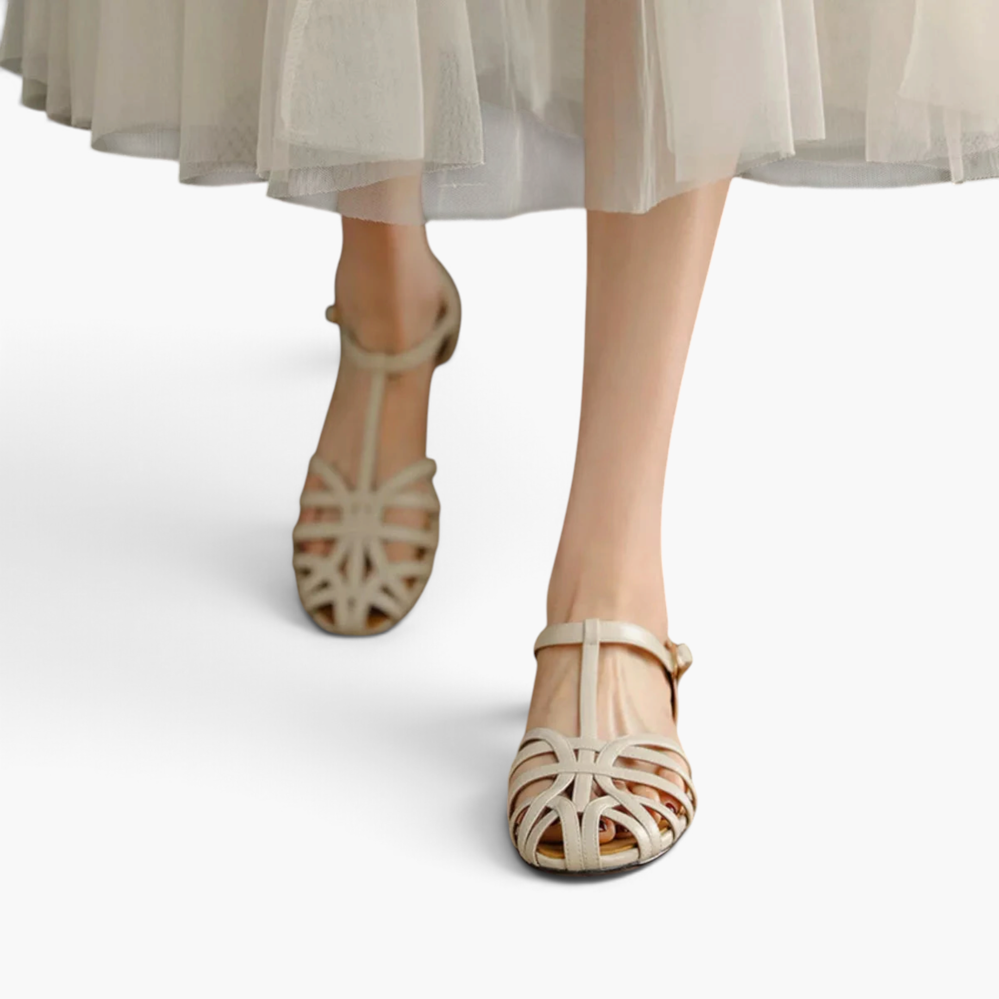 Beach Rose Co. beige PU leather T-bar flat sandals with an interwoven caged strap design and adjustable buckle.