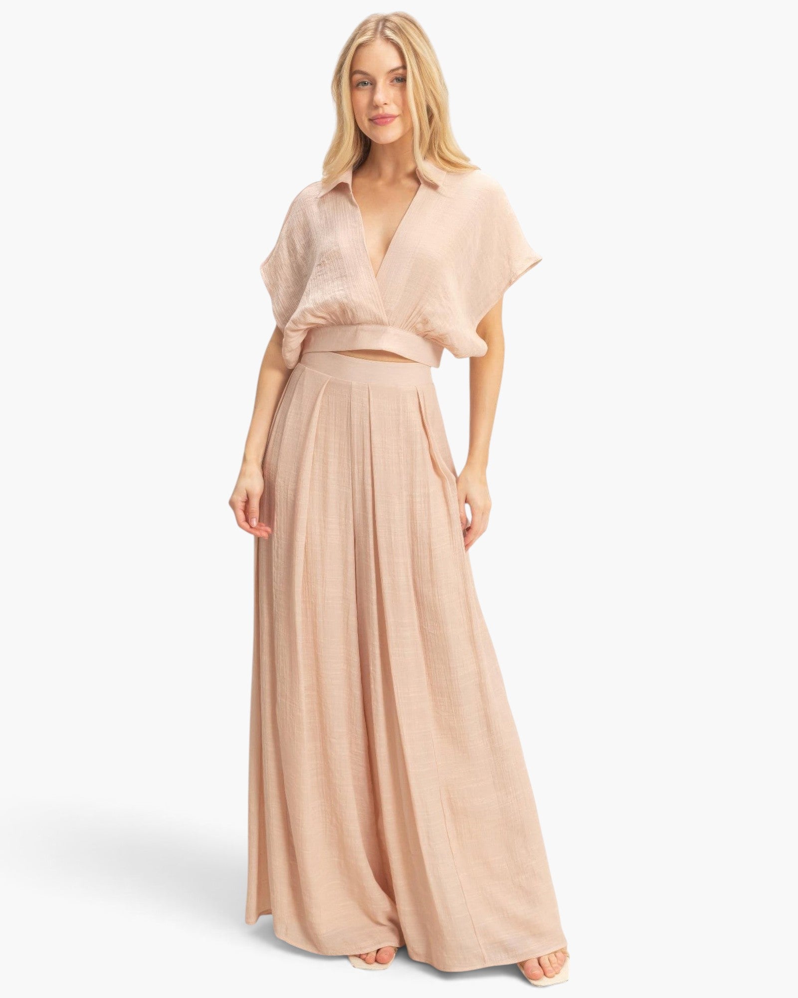 Beach Rose Co. beige cotton-blend two-piece set with a collared wrap top and flowing wide-leg pants on a model