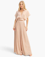 Beach Rose Co. beige cotton-blend two-piece set with a collared wrap top and flowing wide-leg pants on a model