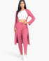 Beach Rose Co. berry ribbed long cardigan and leggings set worn by a woman with a white crop top and sneakers