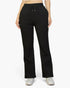 Beach Rose Co. black bootcut sweatpants with a drawstring waist and slant pockets worn by a woman