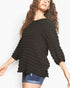 Beach Rose Co. black long sleeve top with bubble knit texture, round neckline, and relaxed fit worn by a model.