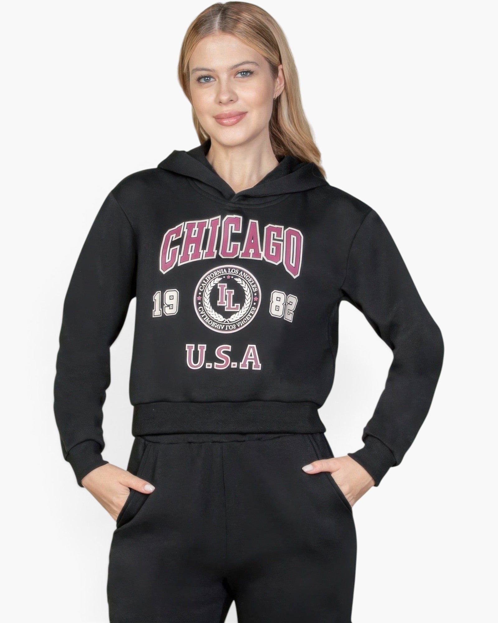 Beach Rose Co. black drop shoulder pullover hoodie with Chicago graphic print worn by a blonde model
