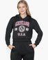 Beach Rose Co. black drop shoulder pullover hoodie with Chicago graphic print worn by a blonde model