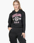 Beach Rose Co. black drop shoulder pullover hoodie with Chicago graphic print worn by a blonde model