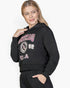 Beach Rose Co. black drop shoulder pullover hoodie with Chicago graphic print worn by a blonde woman
