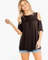 Beach Rose Co. black cold-shoulder top with ruffled sleeves and gathered detailing worn by a smiling blonde model
