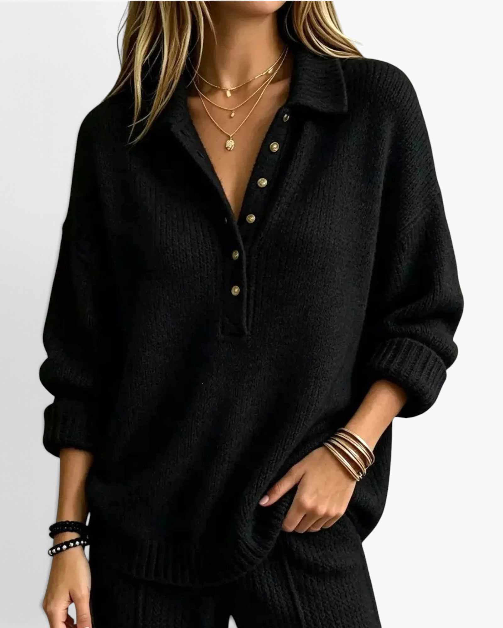 Beach Rose Co. black relaxed knit sweater with a collared button placket, dropped shoulders, and ribbed trim.