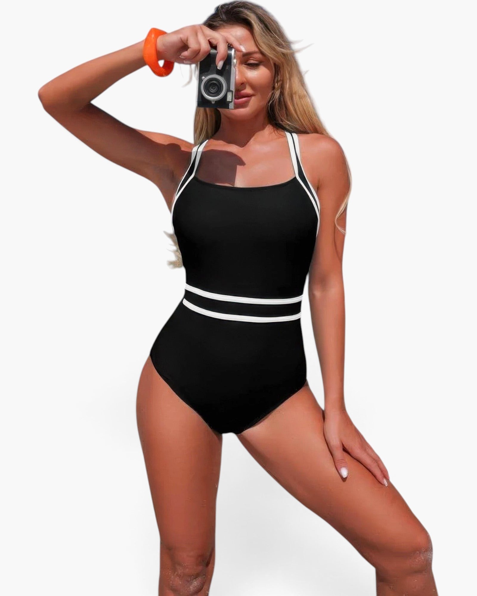 Beach Rose Co. black one-piece swimsuit with white colorblock trim and cross-back straps worn by a blonde model.