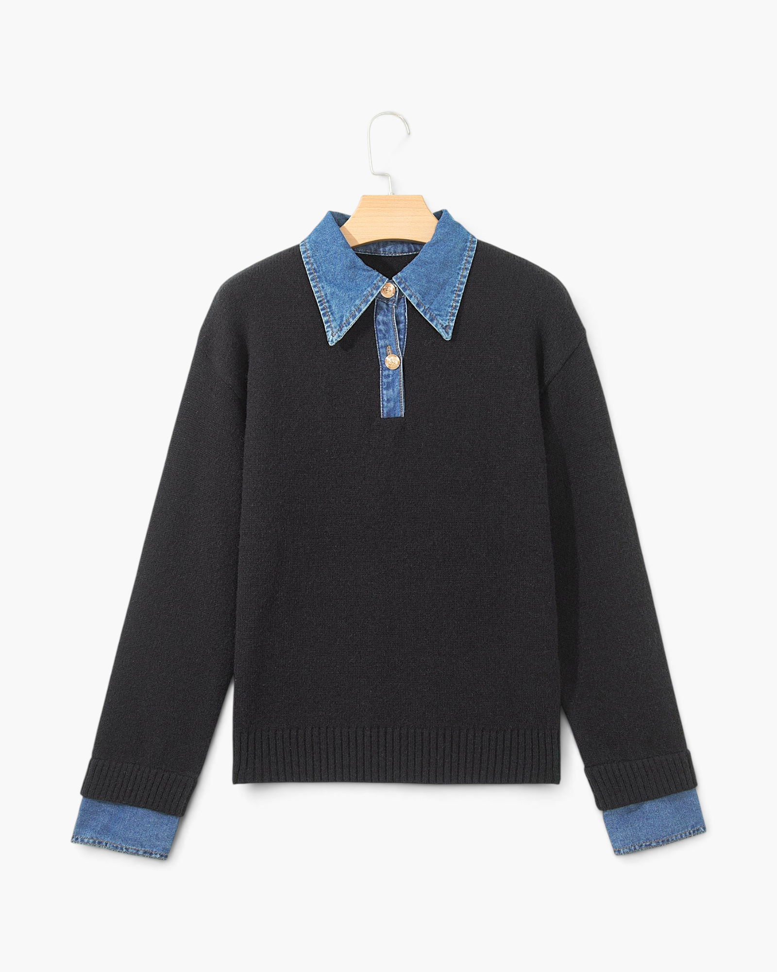 Beach Rose Co. black knit sweater featuring a denim shirt collar and cuffs with gold metal buttons.