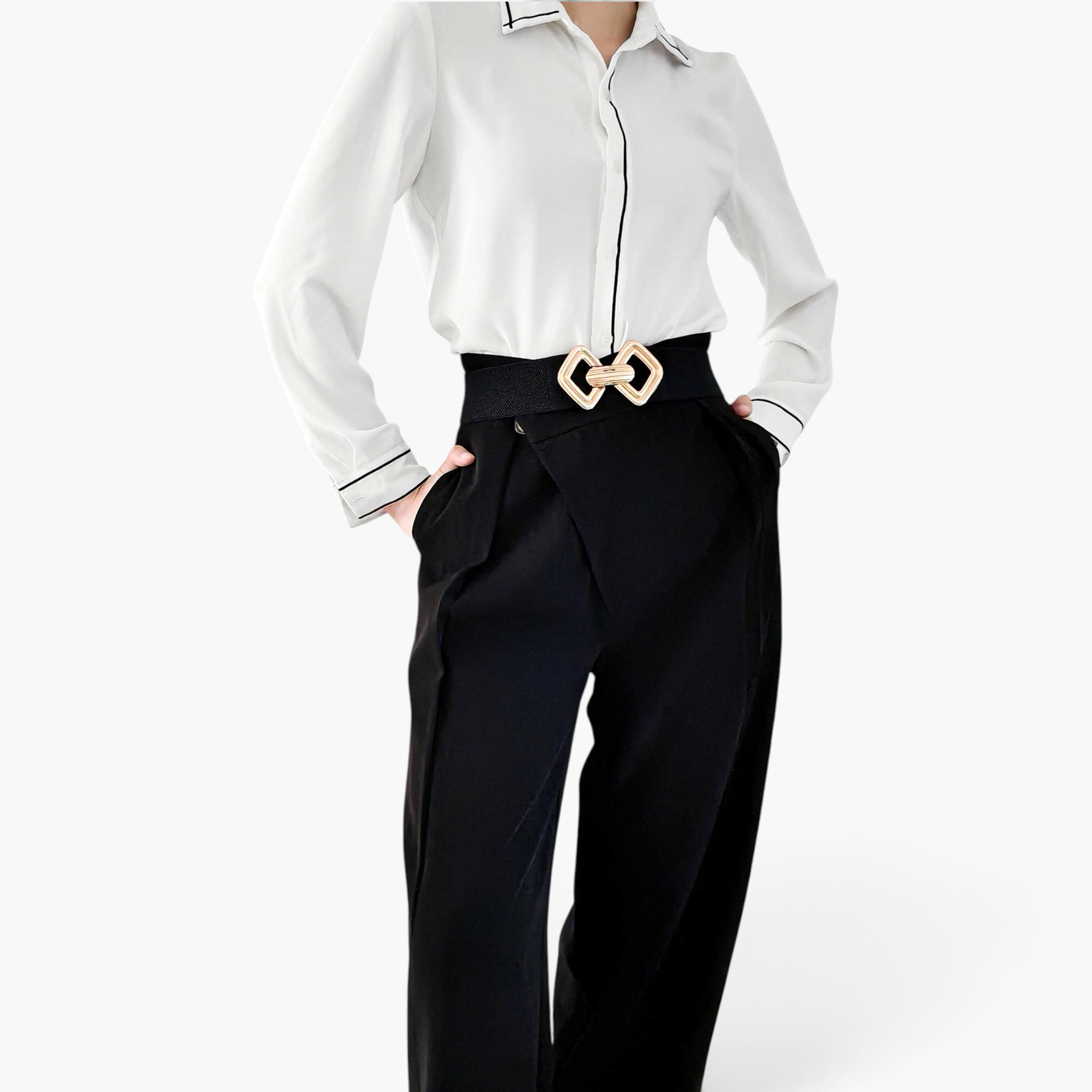 Beach Rose Co. black elastic waist belt featuring a gold geometric double diamond alloy buckle worn over trousers.