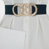 Beach Rose Co. black wide elastic belt featuring a gold-tone triple overlapping textured ring buckle.