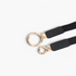 Beach Rose Co. black elastic waist belt featuring an asymmetric double-ring gold alloy buckle and stitched PU tabs.